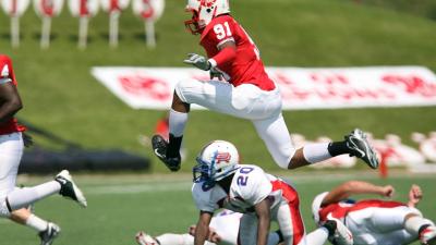 American football players in mid-play